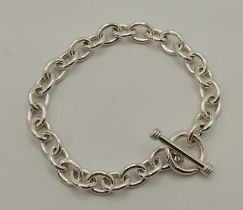 A silver chain link bracelet