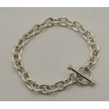 A silver chain link bracelet