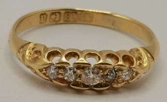 An 18 carat gold five stone ring