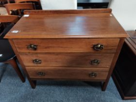 An Arts and crafts style oak 3 height chest with d