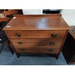 An Arts and crafts style oak 3 height chest with d