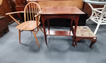 A mahogany side table, Ercol arm chair and a stool