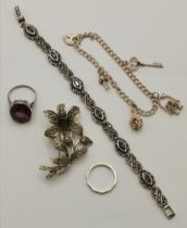 A small group of silver jewellery