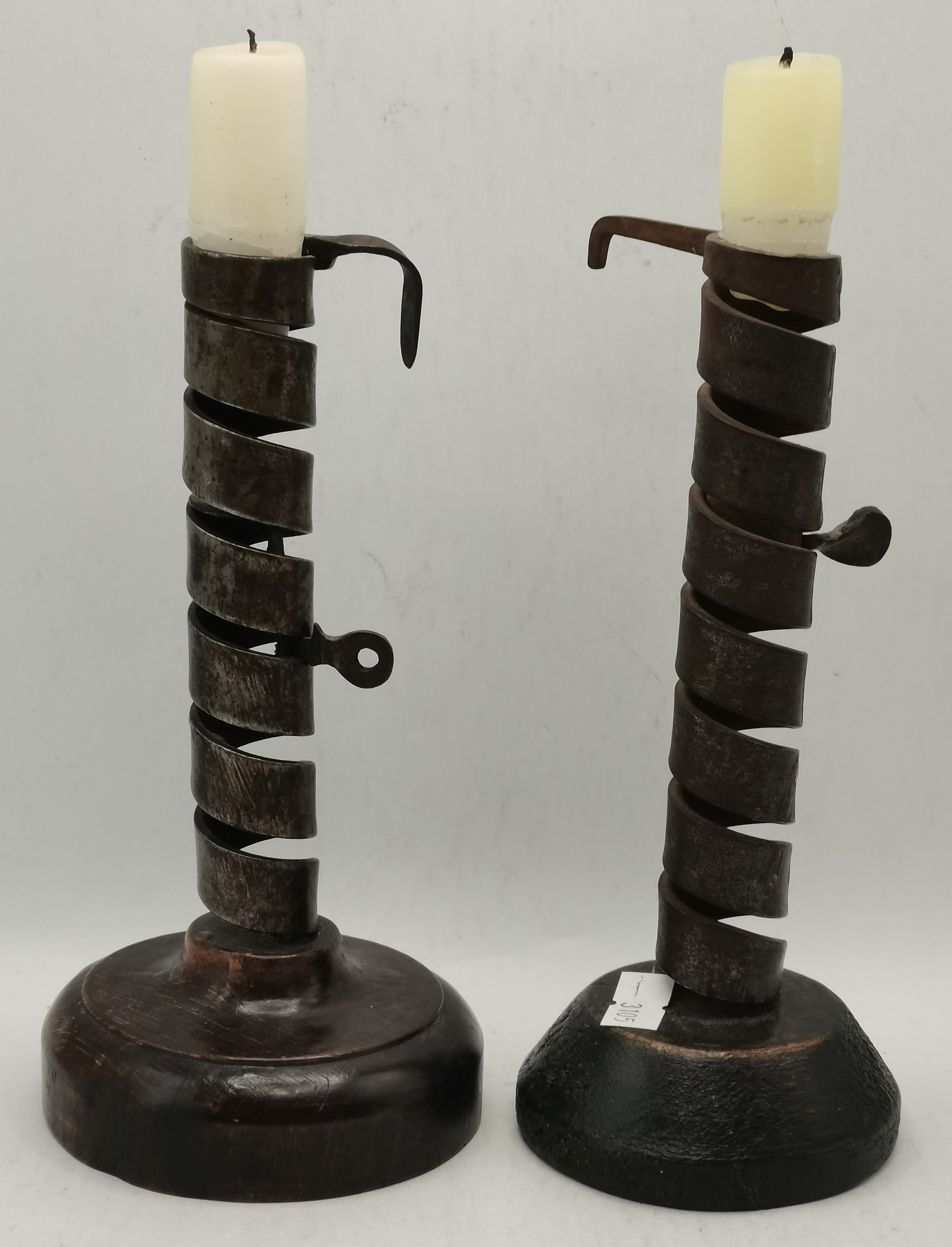 Two French 'rat de cave' wrought iron candlesticks, early-mid 19th Century