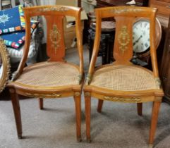 A fine pair of fruitwood and canework hall chairs