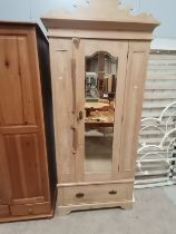 Single pine wardrobe with drawer under and mirrored door