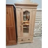 Single pine wardrobe with drawer under and mirrored door