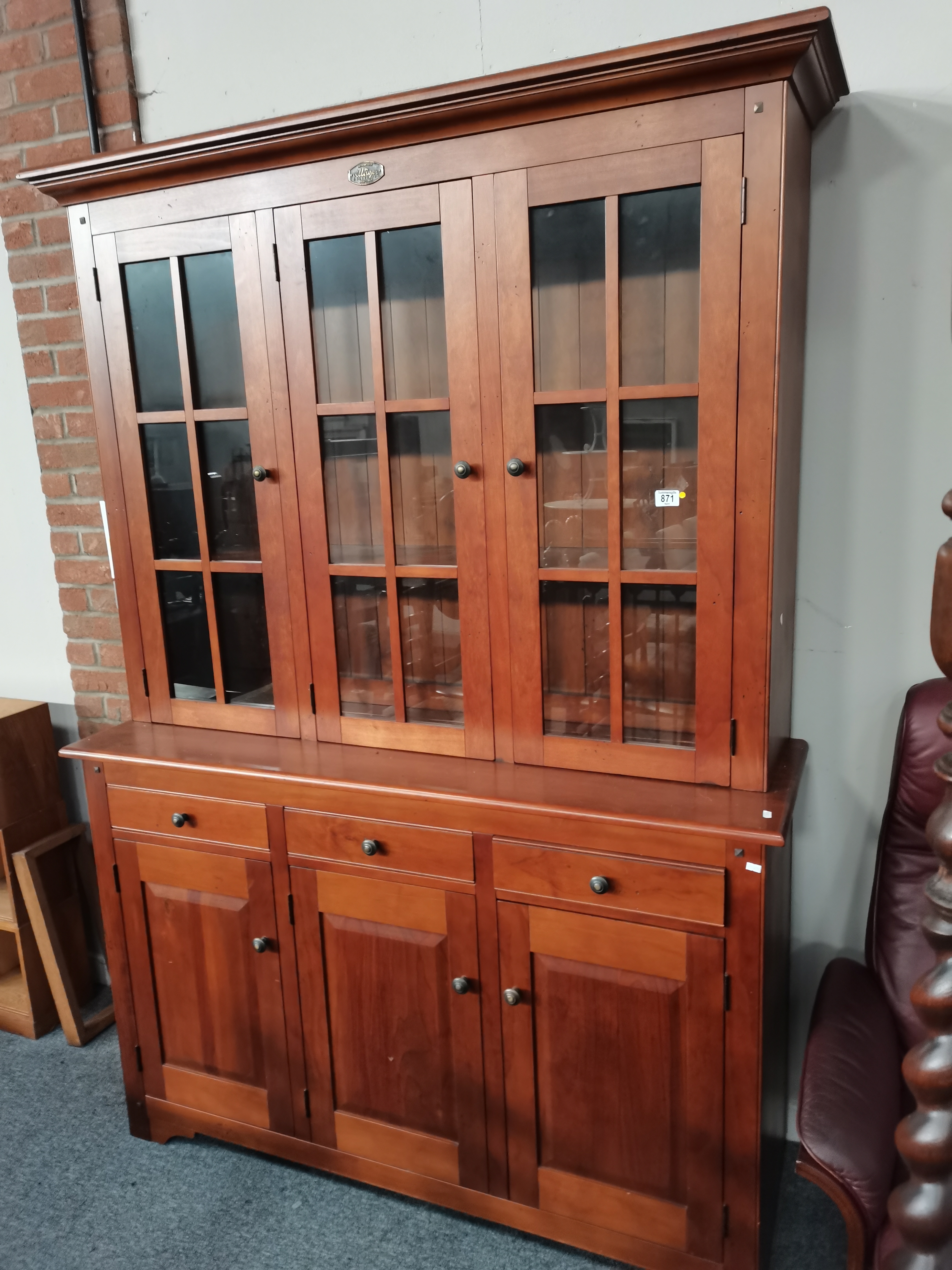 A modern mahogany style bookcase