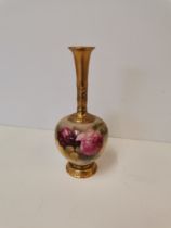 A Royal Worcester narrow necked baluster stem vase