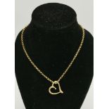 A 9 carat gold necklace chain with heart pendant