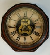 A late 19th Century octagonal mahogany skeleton wall clock