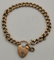A 9 carat gold bracelet with heart padlock clasp