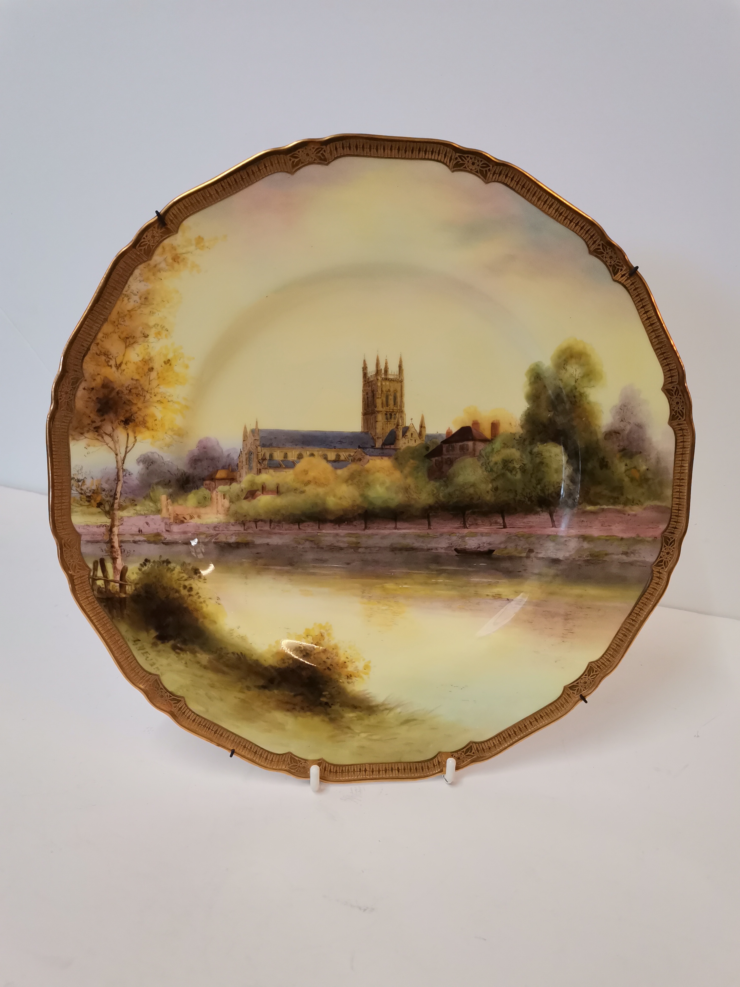 A Royal Worcester landscape cabinet plate by George Evans
