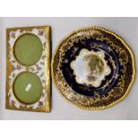 A Coalport cabinet plate, and a French porcelain and gilt-metal twin photograph frame