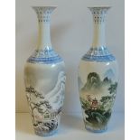 A pair of Chinese vases in their original export boxes