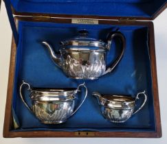 A late Victorian silver-plated three-piece tea service