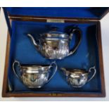 A late Victorian silver-plated three-piece tea service