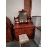 A Victorian mahogany dressing table and stool