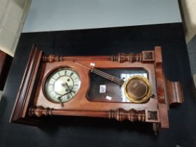 A Victorian walnut Vienna wall clock