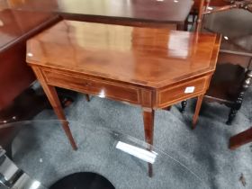 A Georgian mahogany inlaid tea table