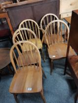 A set of 4 plus carver Ercol chairs