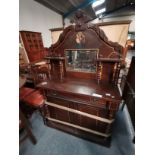 A Victorian chiffonier with decorative religious p