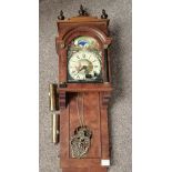 Mahogany wall clock with painted face and brass detail