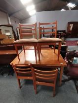 A SCHREIBER dining set with extending dining table and 4 chairs