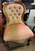 A Victorian mahogany nursing chair