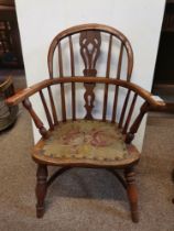 A child's yewood Windsor chair