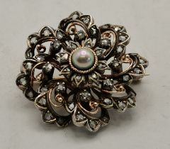 A late 19th Century Continental yellow and white metal pearl and diamond floral cluster brooch