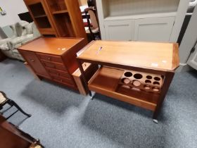 A mid-century Danish style teak drinks trolley, and a side cabinet