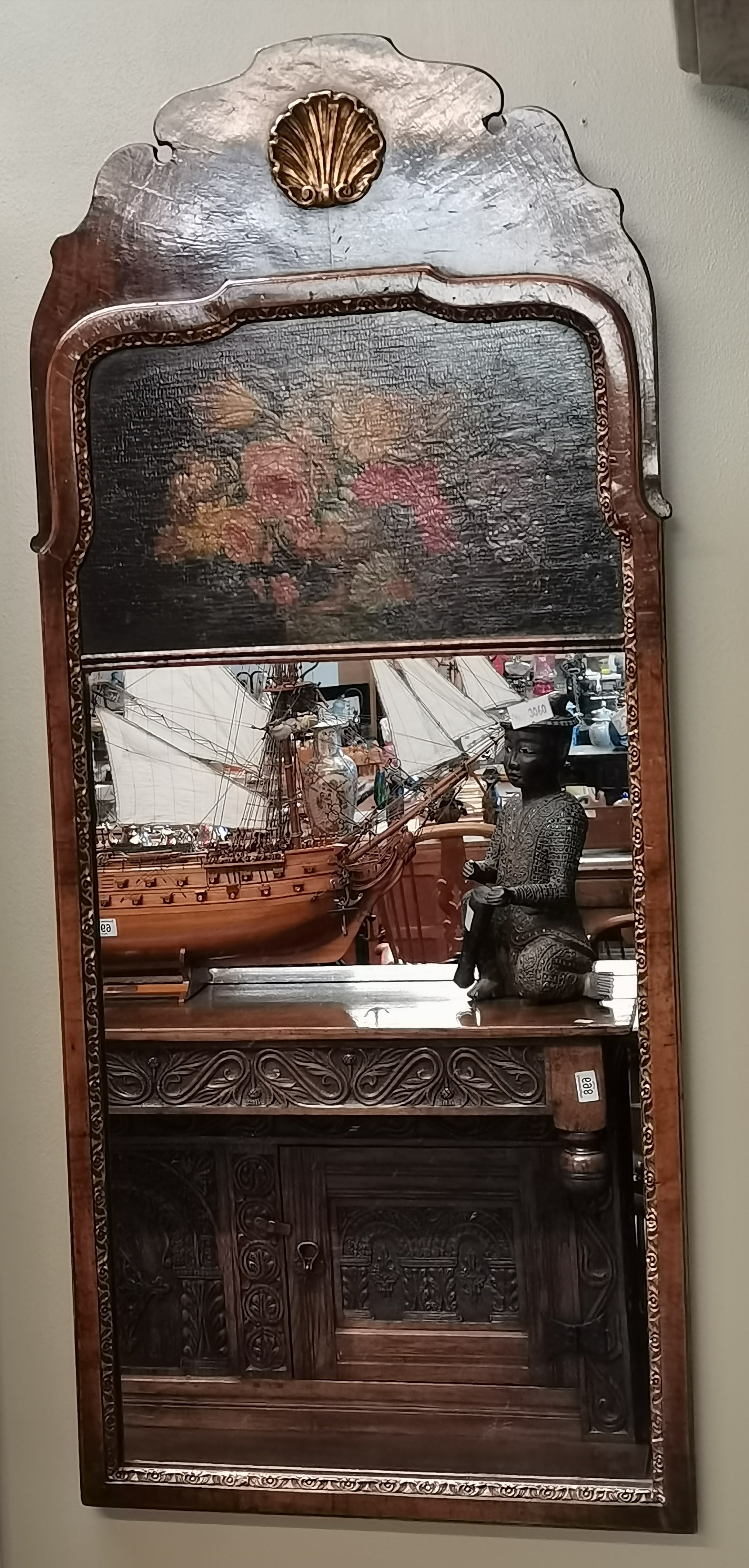 A magnificent pair of burr walnut wall mirrors