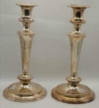 A pair of silver-plated candlesticks