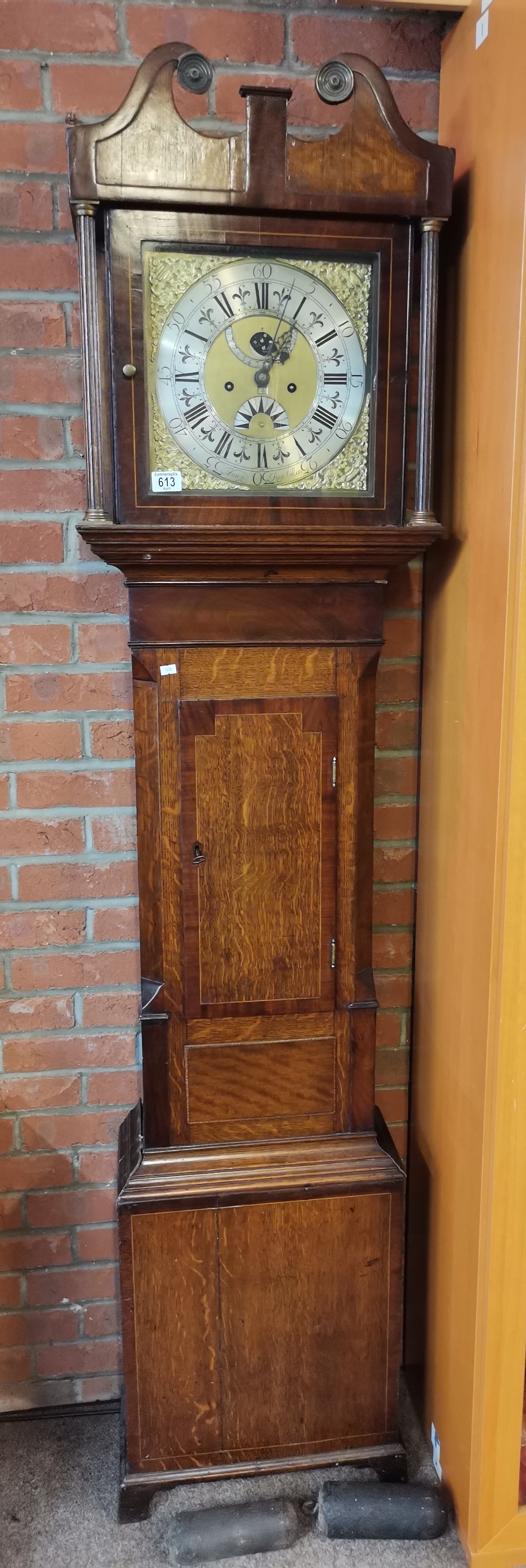 An 8 day oak and mahogany cased long cased clock by