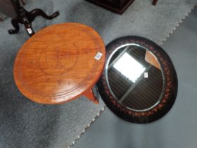 An African style travelling side table plus an Arts and crafts style oval wall mirror