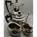 An Edwardian silver four-piece tea service