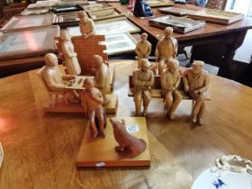 A set of five carved figure groups of country people