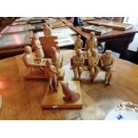 A set of five carved figure groups of country people