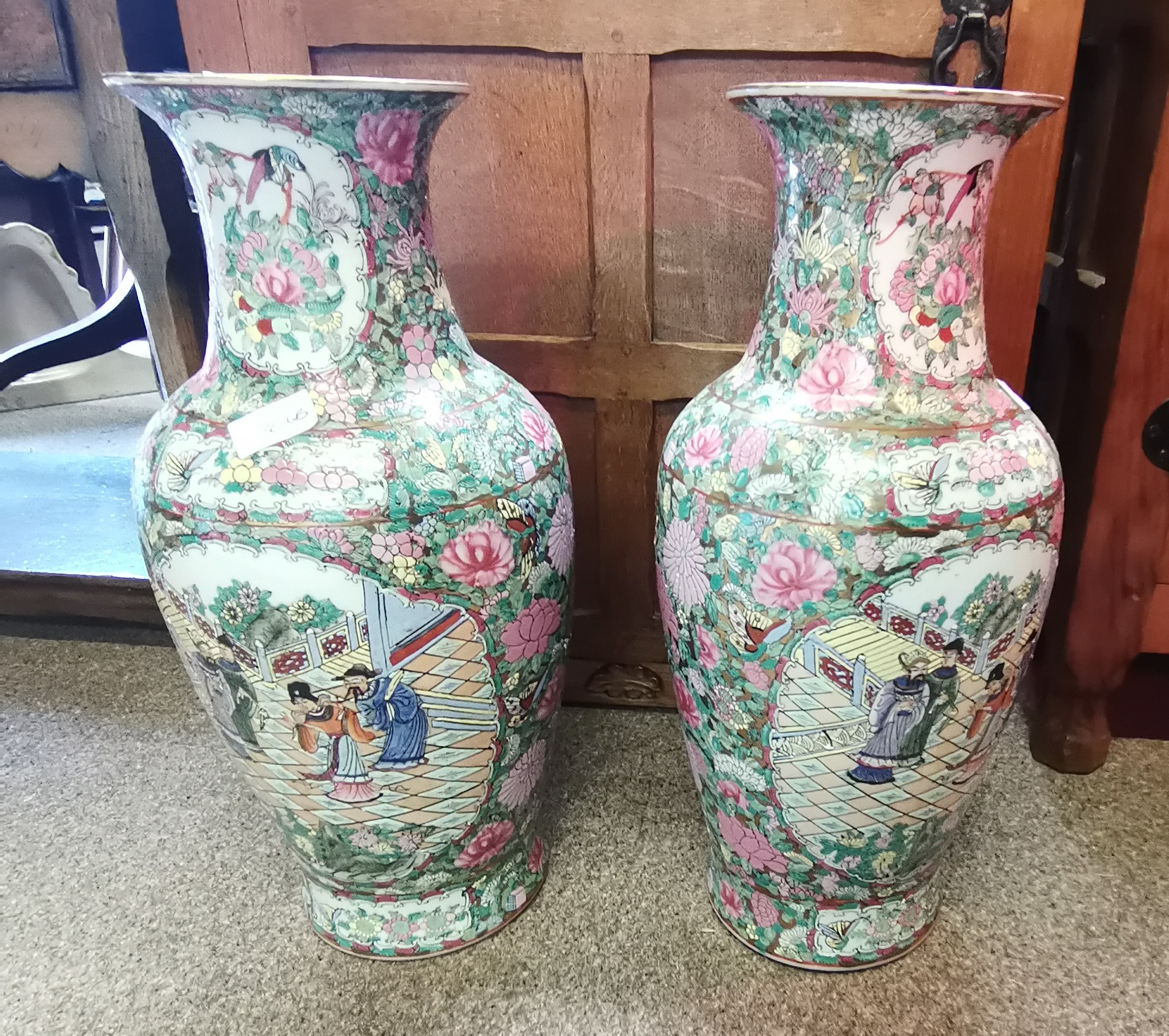A pair of famille rose style vases 48cm high