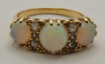 A three-stone opal ring