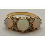 A three-stone opal ring