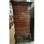 A good Edwardian inlaid mahogany music cabinet