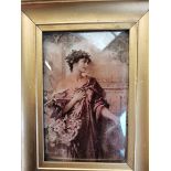 A crystoleum panel portrait of an Art Nouveau lady with flowers 19cm x 14cm