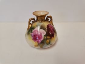 A Royal Worcester squat twin-handled vase by Mildred Hunt