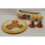 Clarice Cliff: A group of crocus decorated Bizarre wares