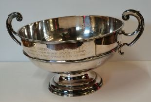 A large Edwardian silver twin-handled presentation pedestal bowl