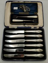 A set of six George VI silver-handled tea knives, etc.