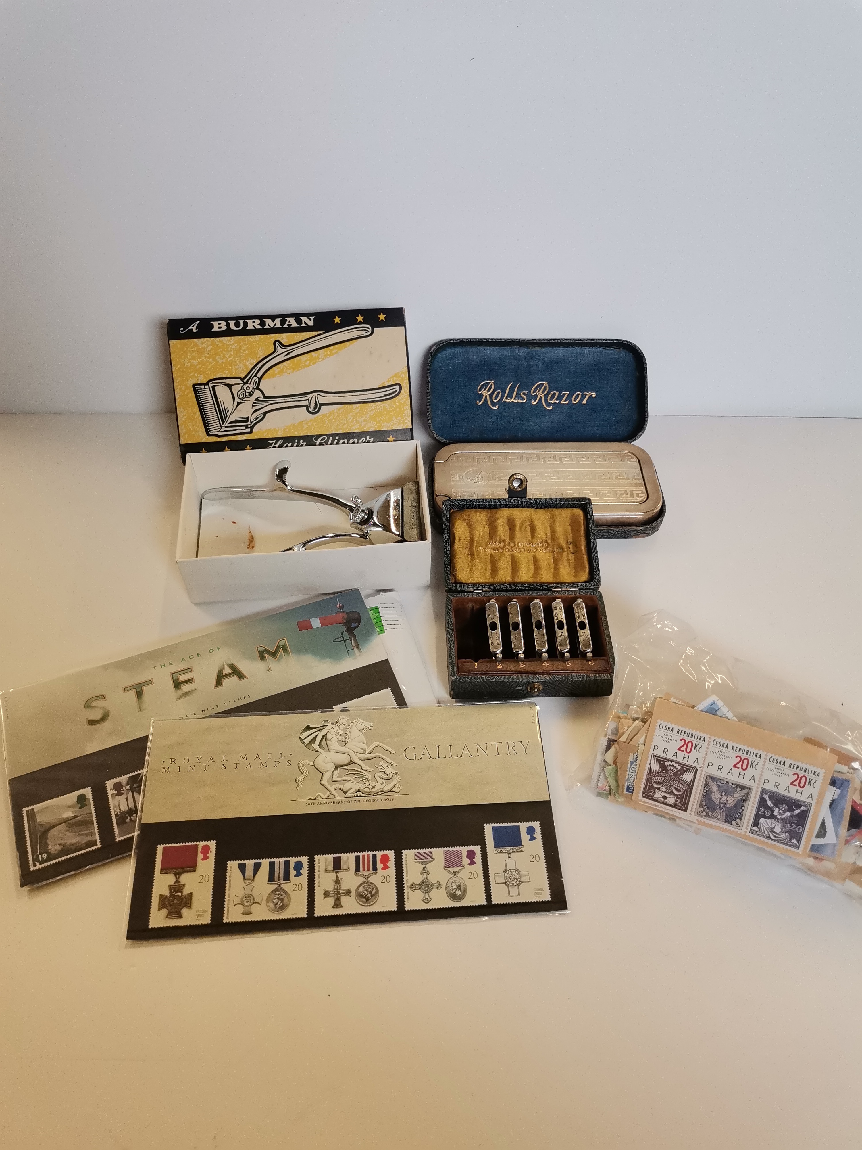 Collection of vintage items incl Rolls Razor blades and sharpener, stamps and cigarette cards