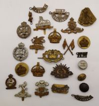 Militaria: A quantity of cap badges, shoulder titles and buttons, British and Commonwealth